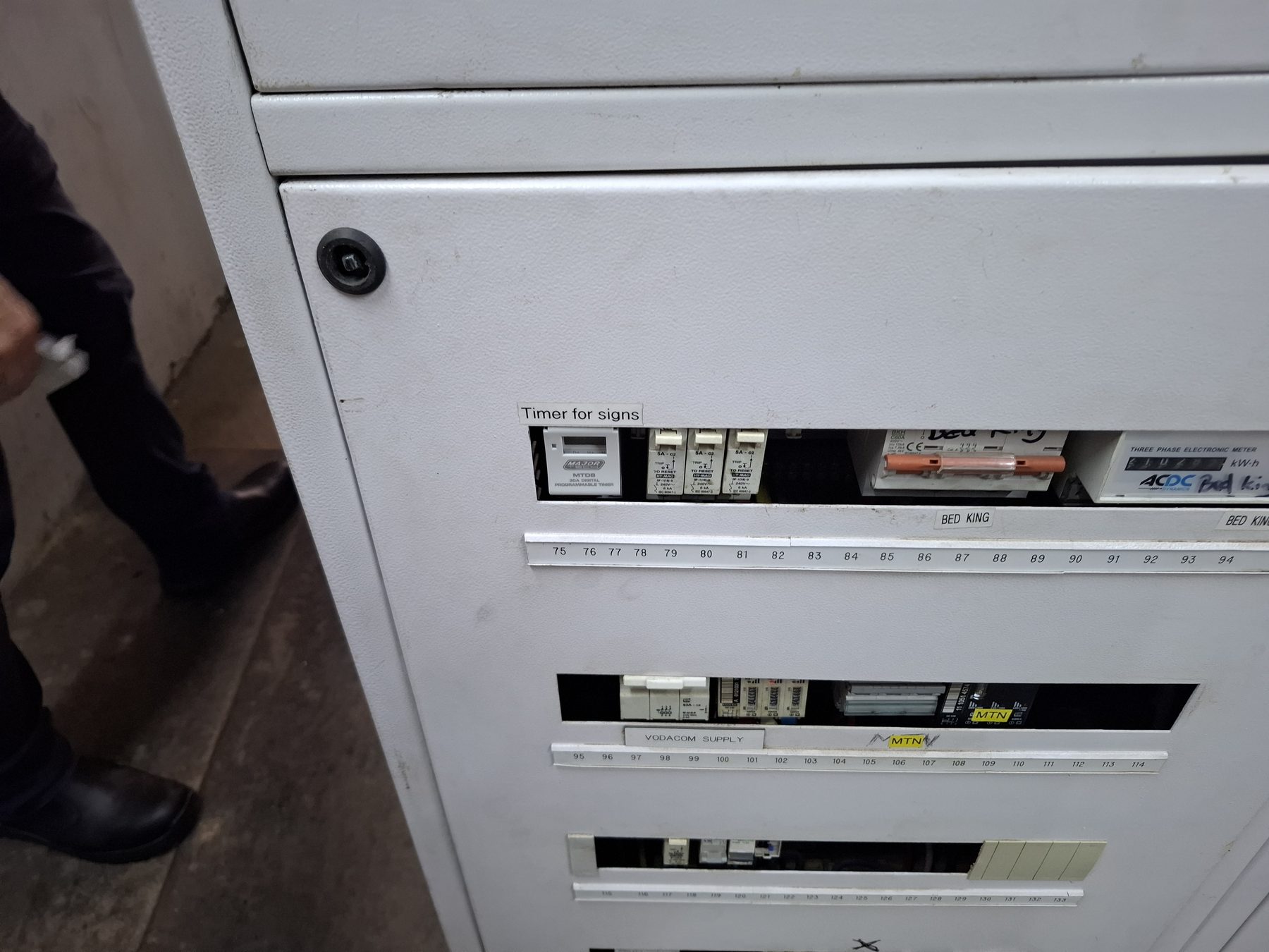 Distribution board exterior showing Timer for signs circuit label