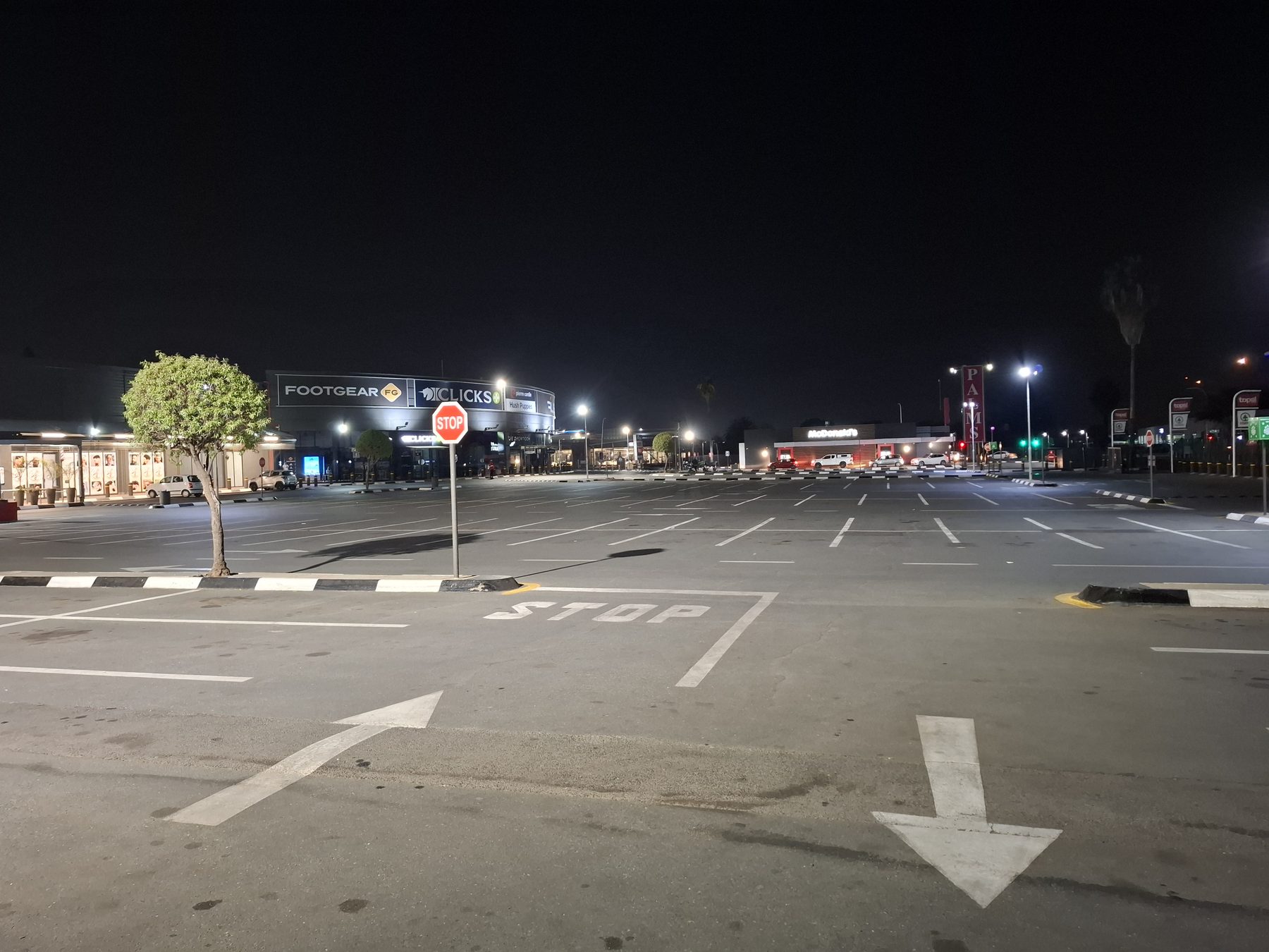 Far end of the parking area, lit by new floodlights