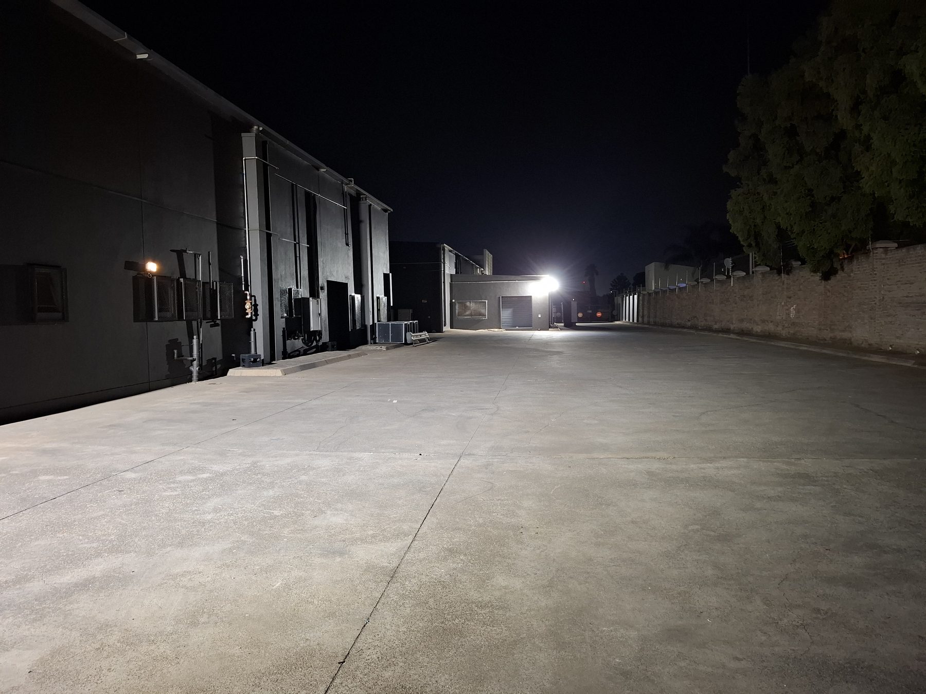 Delivery yard behind the shopping centre lit by new area lighting